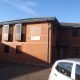 Red brick office building on a sunny day